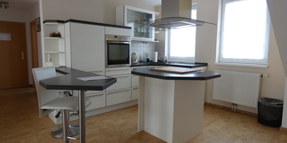 Hundehotel - Nordseeküste - Beispielfoto für Küche im Appartement - NordseeResort Hotel&Suite Arche Noah