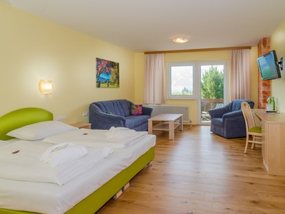 Hundehotel - Wellnessbereich - Geräumige, hundefreundliche Zimmer mit Balkon - Almfrieden Hotel & Romantikchalet