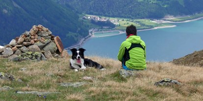 Hundehotel - Hund im Restaurant erlaubt - St. Gallenkirch - Unser Coudy ist immer mit dabei! - Hotel Reschnerhof