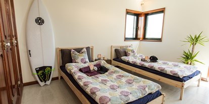 Hundehotel - Unterkunftsart: Appartement - Überwiegend Doppelzimmer bieten genügend Platz für Groß und Klein. - Slide Surfcamp