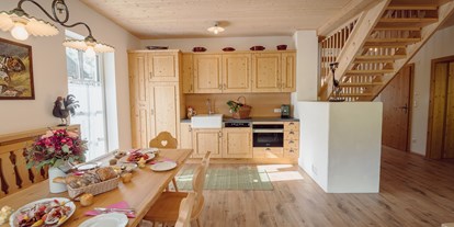 Hundehotel - Unterkunftsart: Appartement - Grundlsee Wohnraum mit Küche - Narzissendorf Zloam
