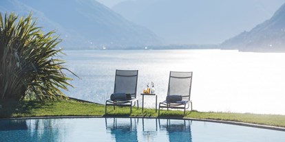 Hundehotel - Dogsitting - Schweiz - Aussicht vom Pool über den Lago Maggiore - Parkhotel Brenscino Brissago