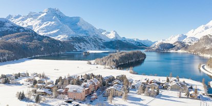 Hundehotel - Wellnessbereich - Graubünden - Parkhotel Margna im Winter, eingebettet zwischen zwei kristallklaren Bergseen - Parkhotel Margna