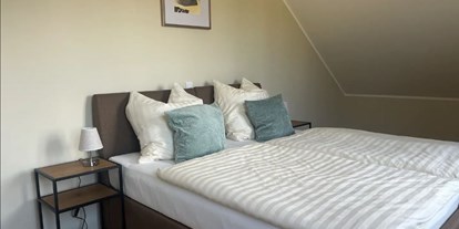 Hundehotel - Whirlpool - Die Wohnung verfügt über 4 Schlafzimmer jeweils mit einem Doppelbett. - Feriendomizil Im Saarschleifenland  (Camille Ollinger )