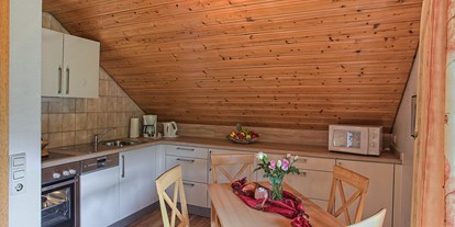 Hundehotel - Unterkunftsart: Ferienhaus - Oberharmersbach - Küche mit Sitzecke - Ferienwohnung Stinneshof