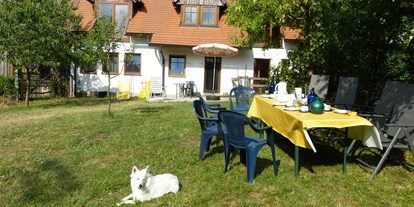 Hundehotel - Hund im Restaurant erlaubt - Castell - Frühstück im Garten - Ferienhof Sommerberg